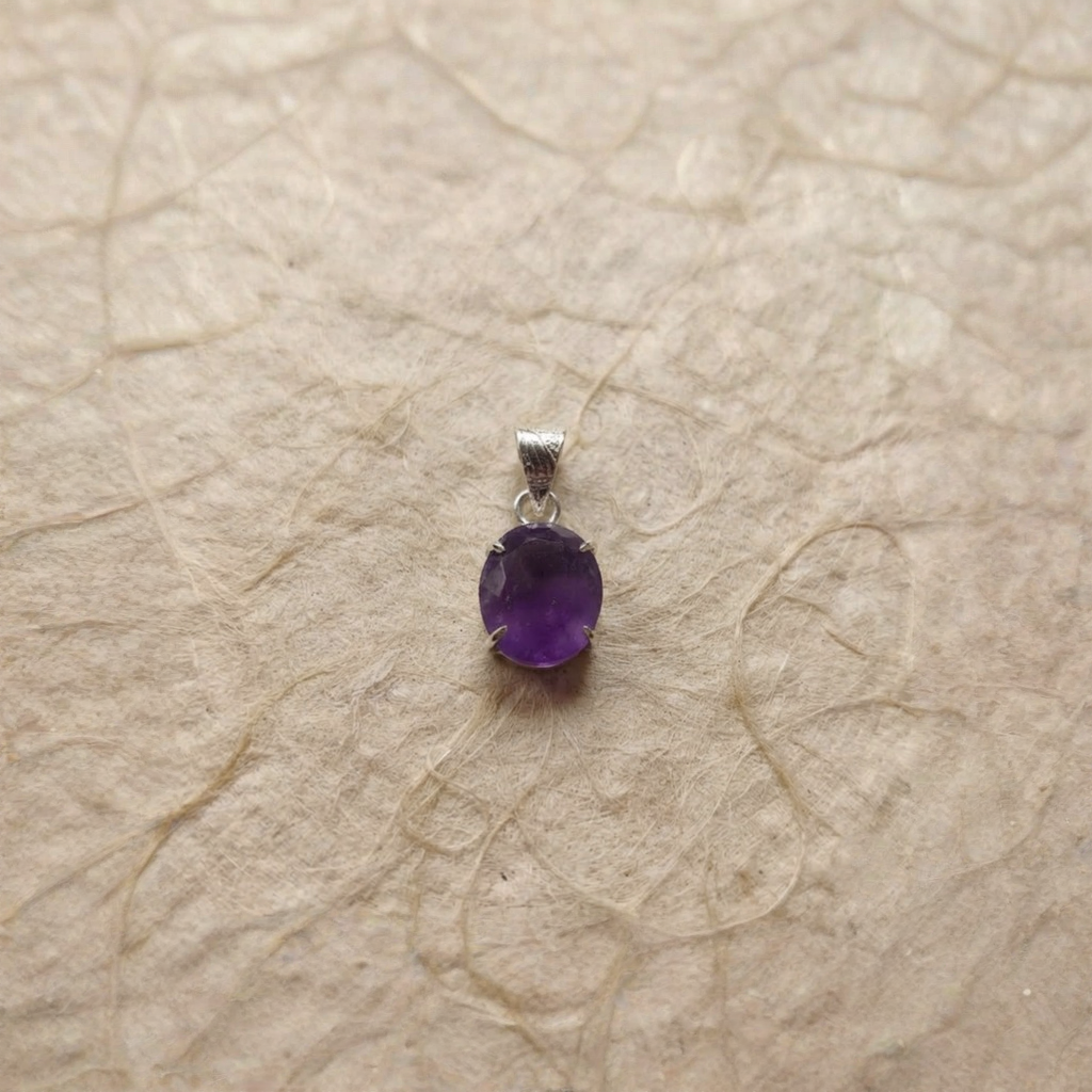Amethyst Necklace Close View Of Oval Purple Stone Pendant On Chain