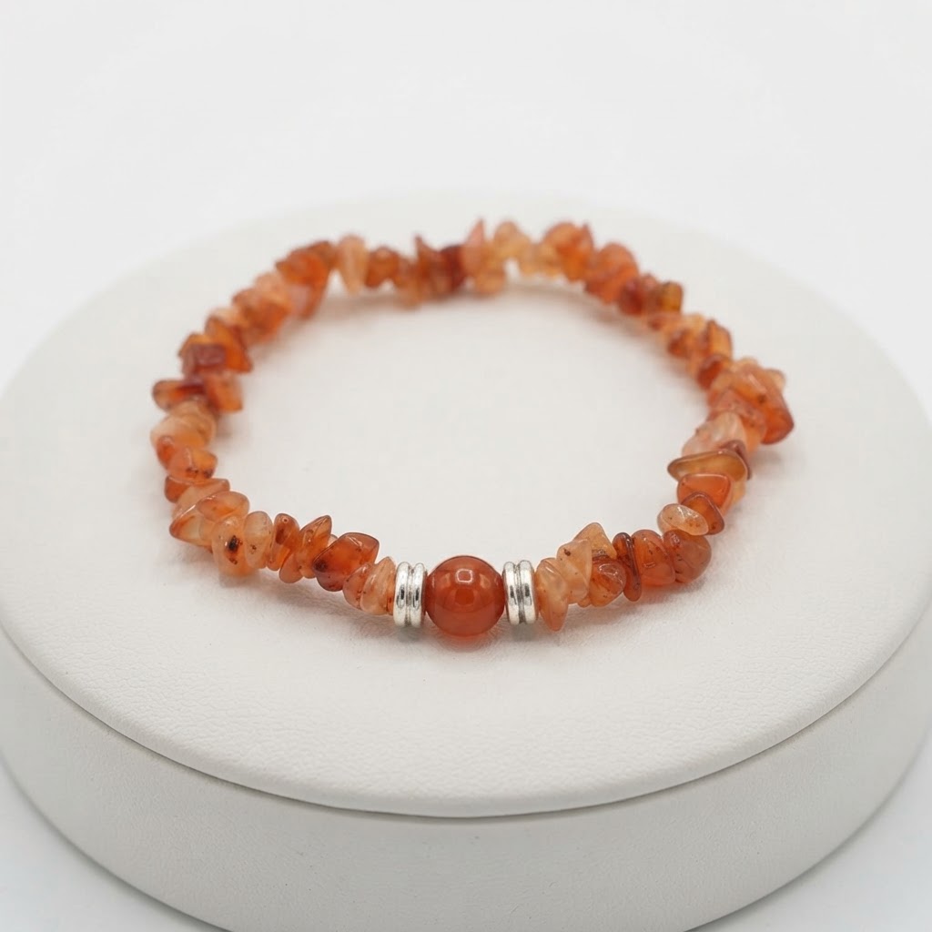 Orange Carnelian Natural Stone Chip Bracelet with Polished Center Bead and Silver Accents Displayed on Wooden Surface | OneTrend India