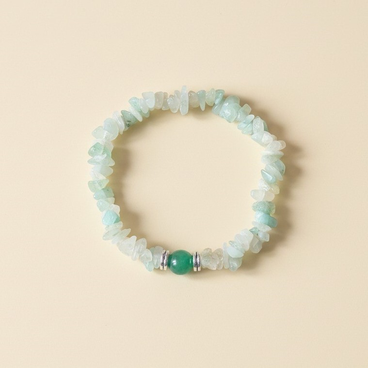 Natural Green Aventurine Crystal Chip Bracelet with Light Green Gemstone Beads, Round Green Center Stone and Silver Spacers on Beige Background | OneTrend India