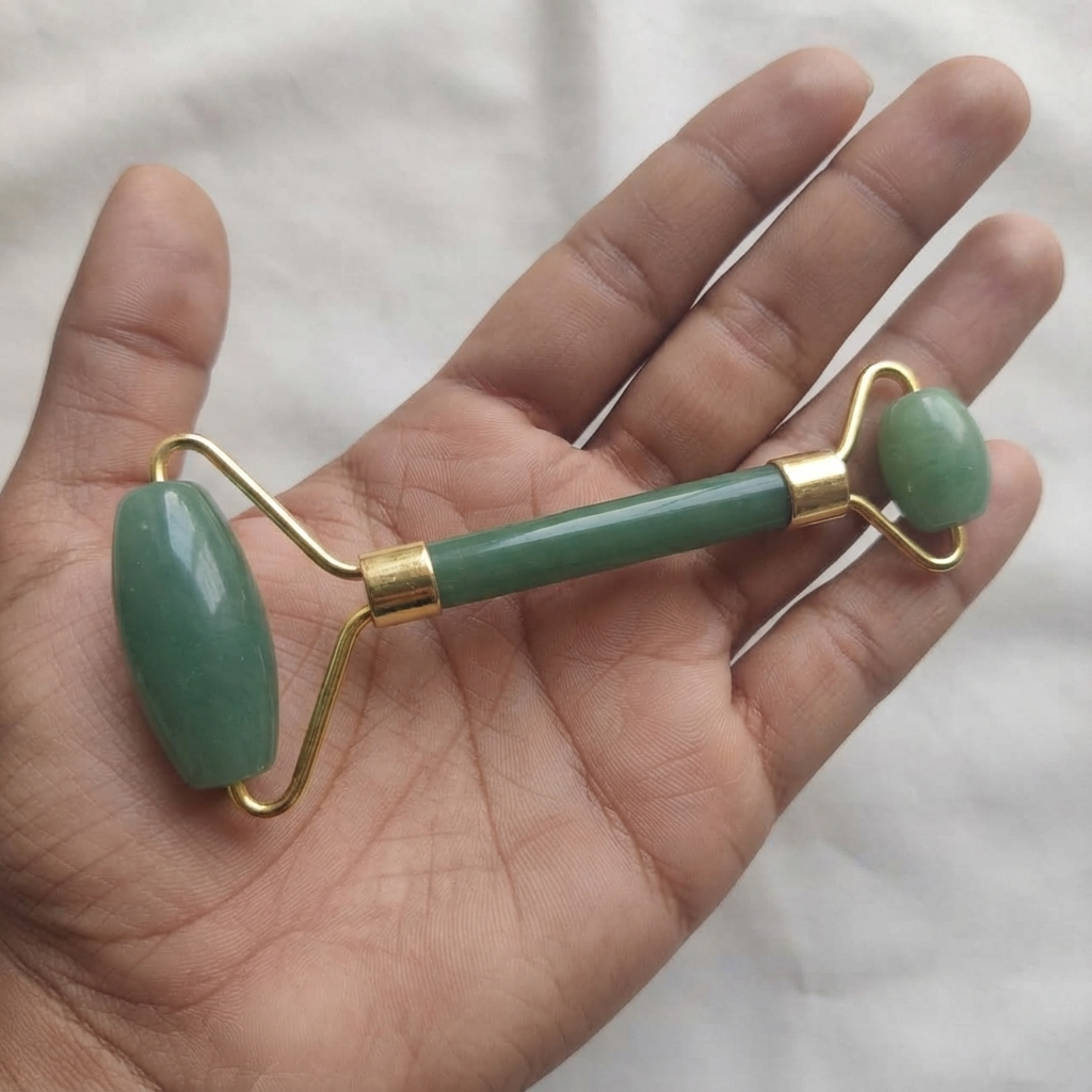 Jade Roller And Gua Sha Set Close View Of Gold-Tone Metal Frame And Green Stone Roller